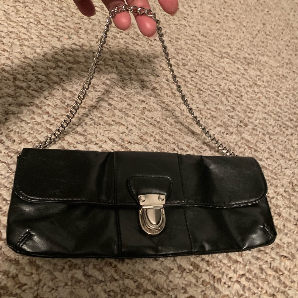 Small black clutch with strap